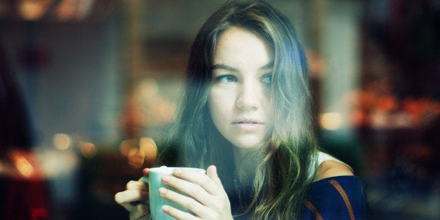 Young Woman with Tea Cap