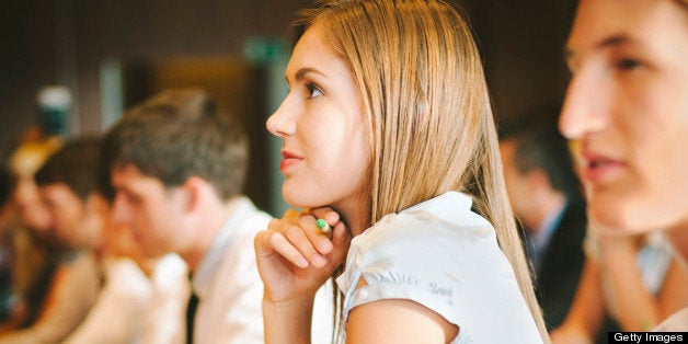 Young woman at a Business seminar.