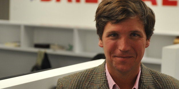 WASHINGTON, DC - JANUARY 7: Tucker Carlson, a conservative pundit, at the office of the new website, the Daily Caller, on Jan