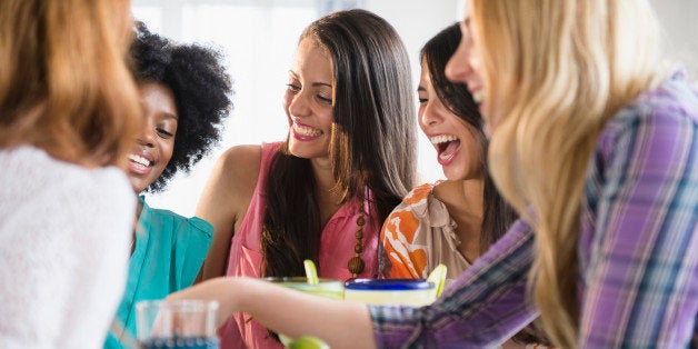 Women eating together at table