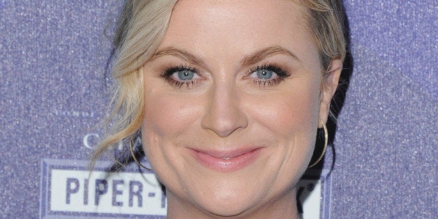 BEVERLY HILLS, CA - FEBRUARY 19: Actress Amy Poehler arrives at the 2nd Annual Unite4:humanity Event at The Beverly Hilton H