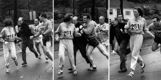 Katherine Switzer of Syracuse, found herself about to be thrown out of the normally all-male Boston Marathon when a husky companion, Thomas Miller of Syracuse, threw a block that tossed a race official out of the running instead, April 19, 1967 in Hopkinton, Mass.(AP PHOTO)