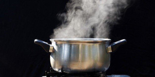 steam on pot in kitchen