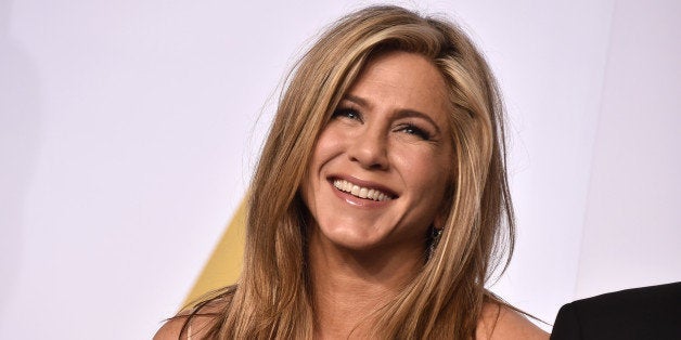 Jennifer Aniston poses in the press room at the Oscars on Sunday, Feb. 22, 2015, at the Dolby Theatre in Los Angeles. (Photo by Jordan Strauss/Invision/AP)