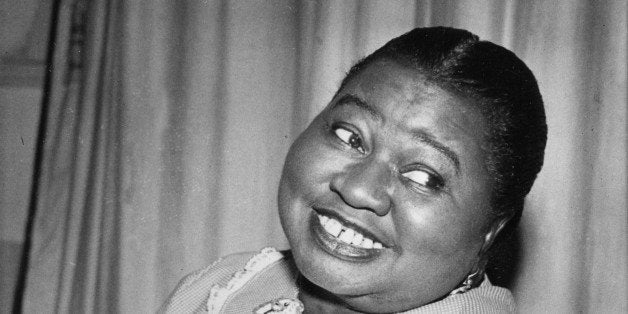 Hattie McDaniel plays a tune as she portrays the title role of "Beulah" in the CBS Radio Network's comedy series in New York City, Aug. 1951. (AP Photo)