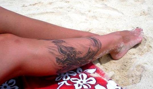 <em>"The Phoenix on my leg symbolizes every time I have had to start over in my life. My childhood was full of abuse at home,