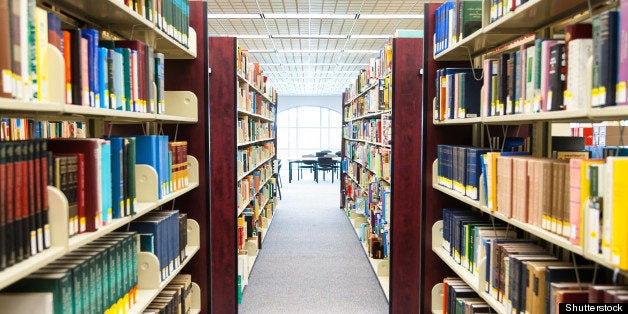 library setting with books and reading material (Please note that many books with legible titles are filler titles that only state the 'type' of materials contained within and date)