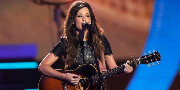 Kacey Musgraves performs on stage at the CMT Music Awards at Bridgestone Arena on Wednesday, June 4, 2014, in Nashville, Tenn. (Photo by Wade Payne/Invision/AP)