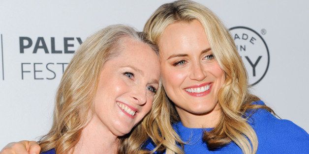 Writer Piper Kerman, left, and actress Taylor Schilling attend PaleyFest: Made In NY - "Orange Is The New Black" panel discussion at The Paley Center for Media on Wednesday, Oct. 2, 2013 in New York. (Photo by Evan Agostini/Invision/AP)