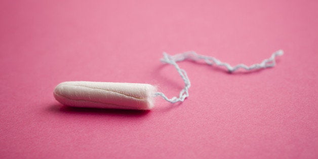 Tampon on pink background