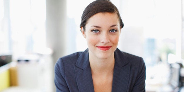 Smiling businesswoman in office