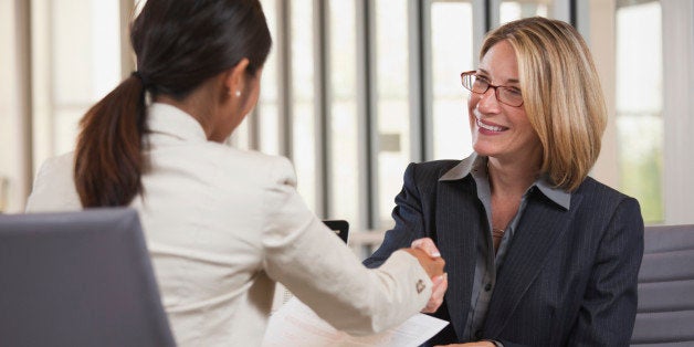 Businesswomen shaking hands