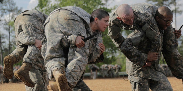 FORT BENNING, GA - APRIL 20: U.S. Army Capt. Kristen Griest (R) participates in training at the U.S. Army Ranger School Apri