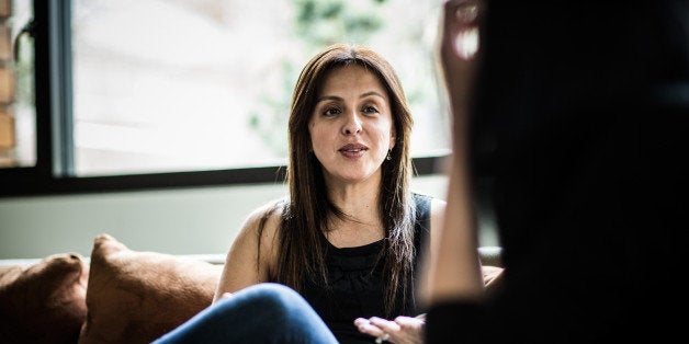 woman talking on couch