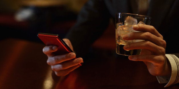 Bar,Japan,Kyoto,smart phoneMan is relaxing in the bar