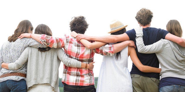 Rear View of Group of Friends Hugging