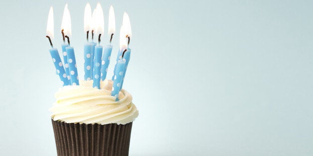 Cupcake decorated with birthday candles