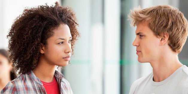 Two university students discussing in campus