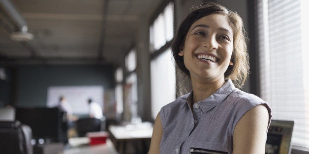 Smiling businesswoman in office