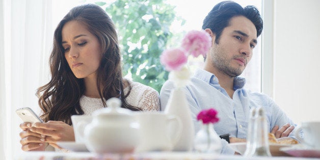 Couple arguing in restaurant