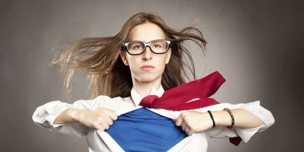 young woman opening her shirt like a superhero