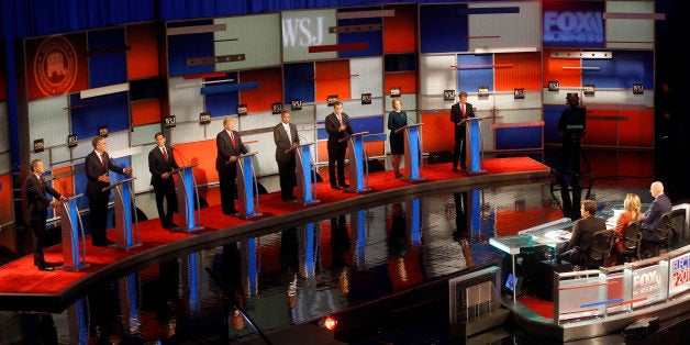 Republican presidential candidates John Kasich, Jeb Bush, Marco Rubio, Donald Trump, Ben Carson, Ted Cruz, Carly Fiorina and Rand Paul appear during Republican presidential debate at Milwaukee Theatre, Tuesday, Nov. 10, 2015, in Milwaukee. (AP Photo/Morry Gash)