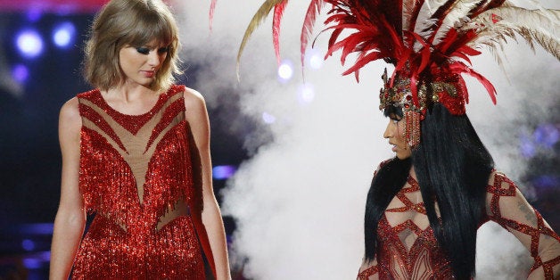 LOS ANGELES, CA - AUGUST 30: Taylor Swift (L) and Nicki Minaj perform onstage during the 2015 MTV Video Music Awards held at