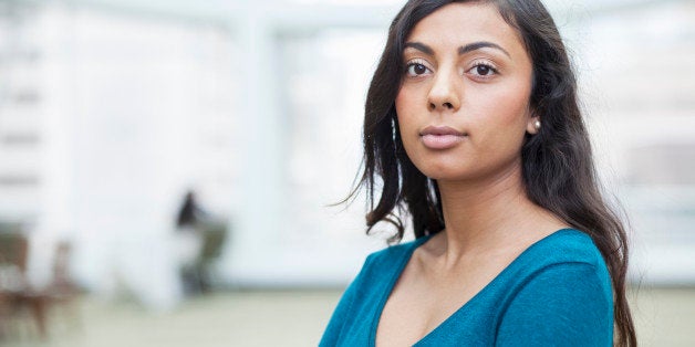 Indian businesswoman standing in office