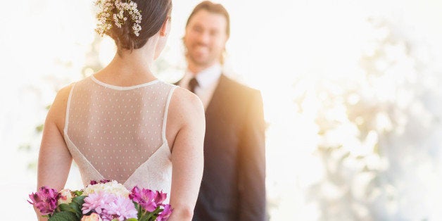 USA, New Jersey, Bride and groom looking at each other 