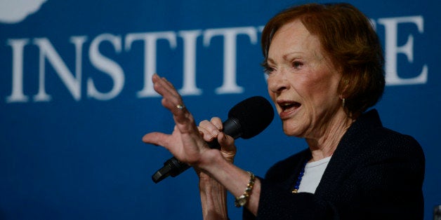 ASPEN, CO - JUNE 23: Former First Lady Rosalynn Carter speaks with President Jimmy Carter and Aspen Institute president and CEO Walter Isaacson during the McCloskey Speaker Series on June 23, 2015 in Aspen, Colorado. (Photo by Leigh Vogel/Getty Images)