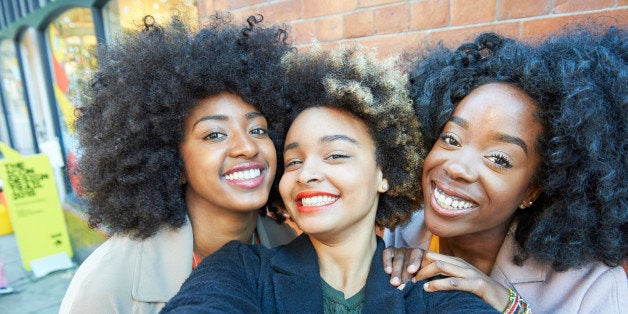 Selfie of three young friends.