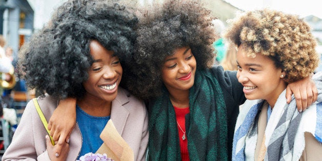 Friends shopping at a flower market.