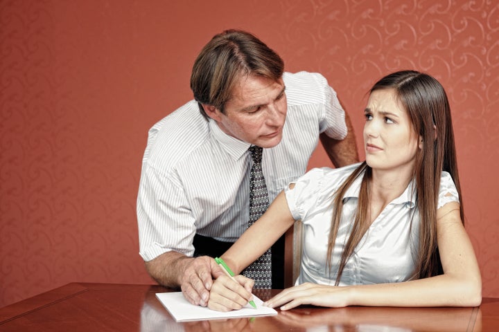 Manager showing inappropriate behavior towards young female co-worker