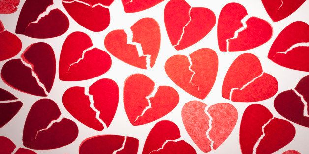 A bunch of red tissue paper broken hearts