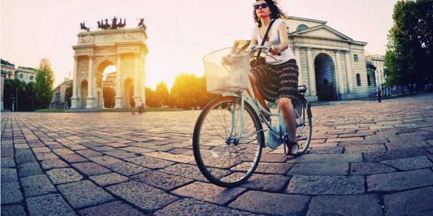 Woman Cycling in Milan