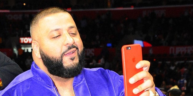 LOS ANGELES, CA - MARCH 13: LeBron James #23 of the Cleveland Cavaliers and DJ Khaled during the game against the Los Angel