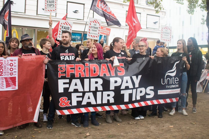 Workers gathered outside the Leicester Square McDonald's