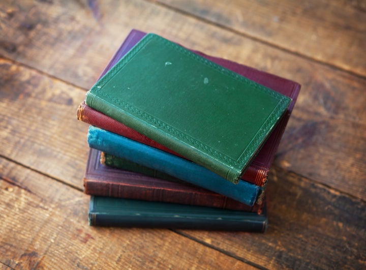 old books on white old wooden...