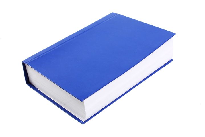 very thick blue book isolated...