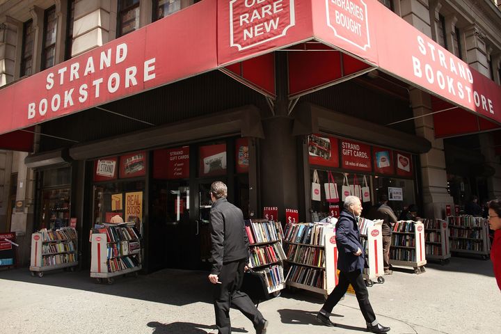 NEW YORK, NY - APRIL 02: People walk by the Strand Bookstore on April 2, 2012 in New York City. Workers and owners of the Strand are in a contract dispute over healthcare contributions, a two-tier wage system and other benefits. Part of the United Autoworker's Union, the store's 140 non-management employees will vote on a new contract this week. (Photo by Spencer Platt/Getty Images)