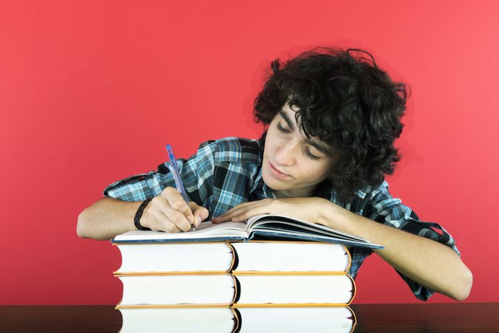 young student studying his exam.