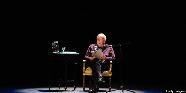 Uruguayan writer Eduardo Galeano reads from his new book 'Los hijos de los dias' (The sons of the days) at the Solis Theater in Montevideo on April 3, 2012. AFP PHOTO/Miguel ROJO (Photo credit should read MIGUEL ROJO/AFP/Getty Images)
