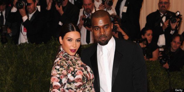 NEW YORK, NY - MAY 06: Kim Kardashian and Kanye West attend the Costume Institute Gala for the 'PUNK: Chaos to Couture' exhibition at the Metropolitan Museum of Art on May 6, 2013 in New York City. (Photo by Jamie McCarthy/Getty Images for The Huffington Post) 
