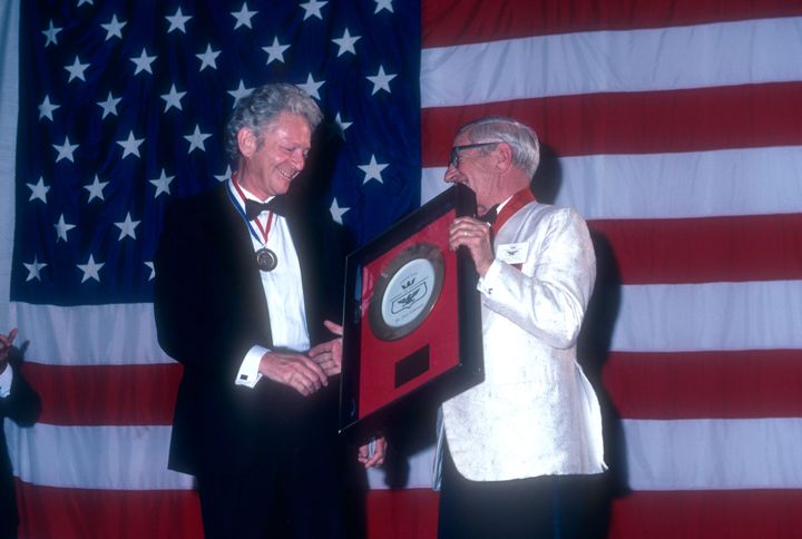 Leon Lederman receives an accolade at the Academy of Achievement Golden Plate Awards on June 24, 1982, in New Orleans.