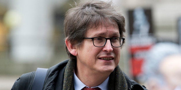 Guardian editor-in-chief, Alan Rusbridger, arrives to attend the publication of the Leveson Report into press ethics in central London on November 29, 2012 after a major inquiry launched in the wake of the News Of The World phone-hacking scandal. A major inquiry called for new laws to underpin a tougher watchdog for Britain's 'outrageous' newspapers in a move that threatens to split Prime Minister David Cameron's coalition government. AFP PHOTO / CARL COURT (Photo credit should read CARL COURT/AFP/Getty Images)