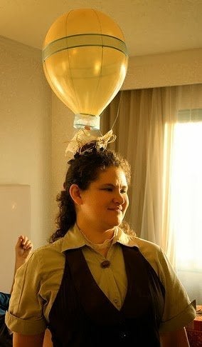 Here some friends created hot air balloon hats for a very silly event using string, ribbon, glue, and tiny baskets. 