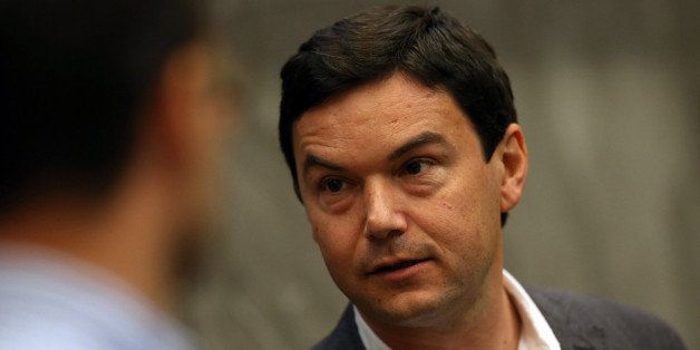 BERKELEY, CA - APRIL 23: Economist and author Thomas Piketty prepares to speak to the Department of Economics at the University of California, Berkeley on April 23, 2014 in Berkeley, California. Economist author Thomas Piketty gave a lecture about his best-selling book titled 'Capital in the 21st Century' at UC Berkeley's Department of Economics. (Photo by Justin Sullivan/Getty Images)