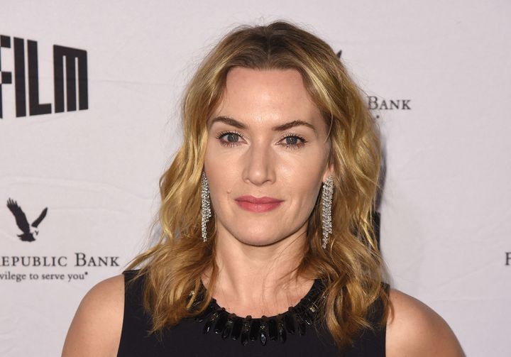 "For my own children, I do want for them to look back and remember that it was me in the kitchen, that I was doing the packed lunches, that we were there on the school run, that we did take a bus," Kate Winslet said.