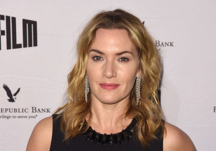 "For my own children, I do want for them to look back and remember that it was me in the kitchen, that I was doing the packed lunches, that we were there on the school run, that we did take a bus," Kate Winslet said.