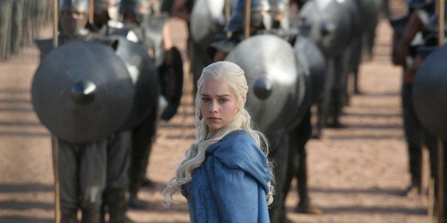 This publicity image released by HBO shows Emilia Clarke in a scene from "Game of Thrones." The program was nominated for an Emmy Award for outstanding drama series on, Thursday July 18, 2013. Clarke was also nominated for best supporting actress. The Academy of Television Arts & Sciences' Emmy ceremony will be hosted by Neil Patrick Harris. It will air Sept. 22 on CBS.. (AP Photo/HBO, Keith Bernstein)